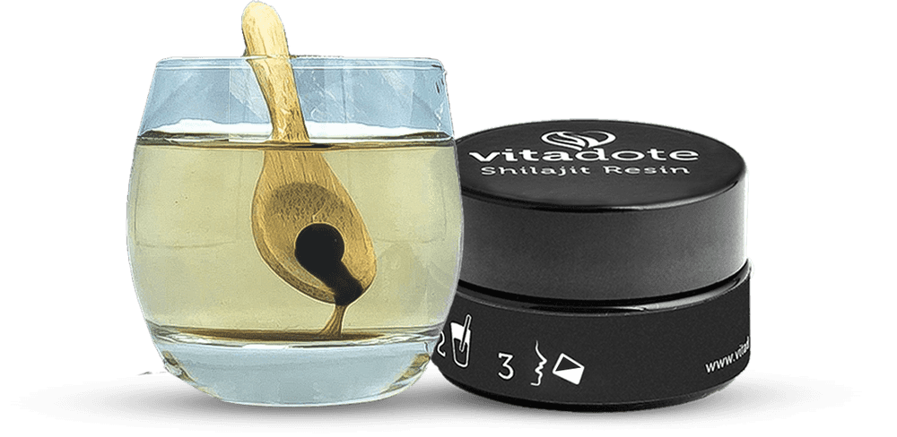 Dissolved Shilajit resin in a glass of water
